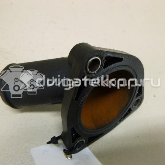 Фото Крышка термостата  1148329 для Ford Fiesta / Focus / Tourneo / Sierra / C-Max