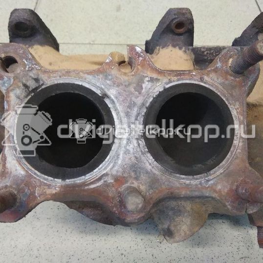 Фото Коллектор выпускной для двигателя AKL для Volkswagen / Seat 101-103 л.с 8V 1.6 л бензин 06A253031AQ