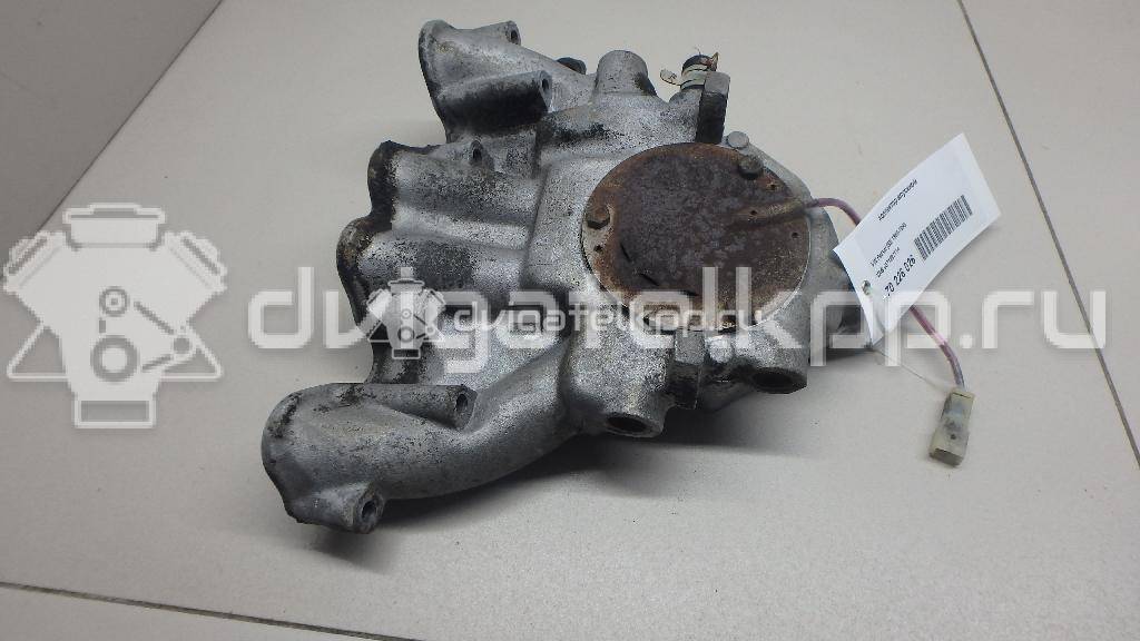 Фото Коллектор впускной для двигателя RP для Volkswagen / Seat 88 л.с 8V 1.8 л бензин 037129711A {forloop.counter}}