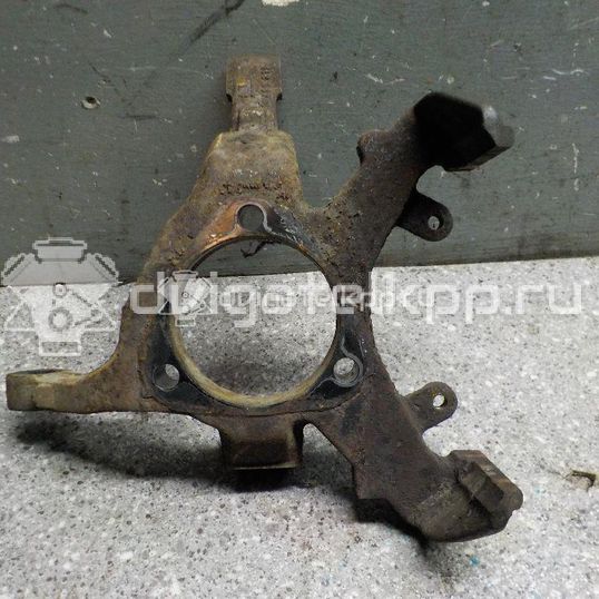 Фото Кулак поворотный передний правый  90498811 для Opel Astra / Zafira