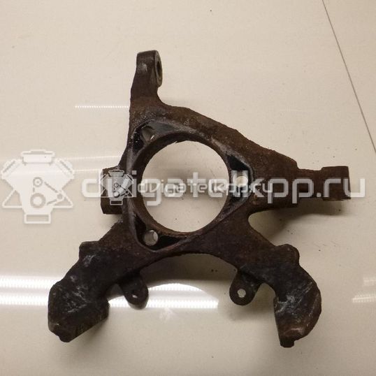 Фото Кулак поворотный передний правый  90498811 для Opel Astra / Zafira