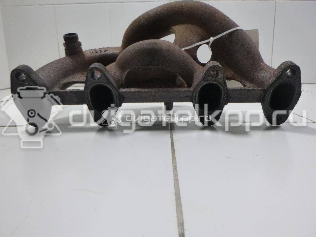 Фото Коллектор выпускной для двигателя ALZ для Volkswagen Passat 102 л.с 8V 1.6 л бензин 06B253031K {forloop.counter}}