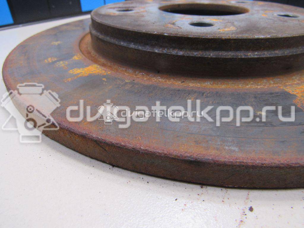 Фото Диск тормозной задний  4721996AA для Dodge Caravan / Grand Caravan / Journey {forloop.counter}}