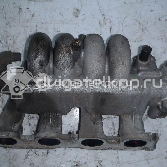 Фото Коллектор впускной для двигателя B 4164 S2 для Volvo V40 / S40 109 л.с 16V 1.6 л бензин 9471977