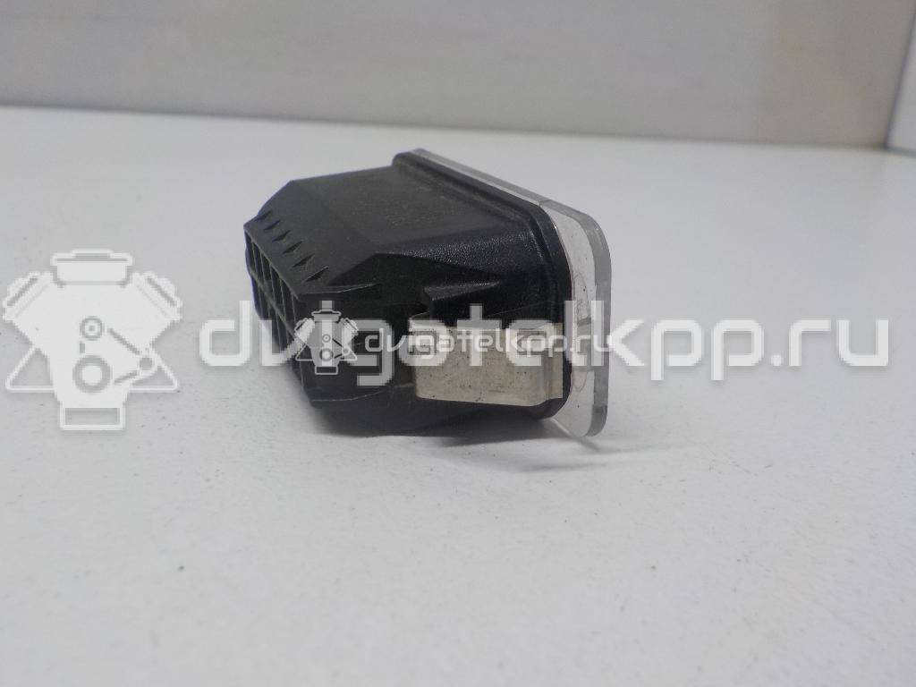 Фото Фонарь подсветки номера  6M2A13550AC для Ford Fiesta / Focus / Tourneo / C-Max / Ka {forloop.counter}}