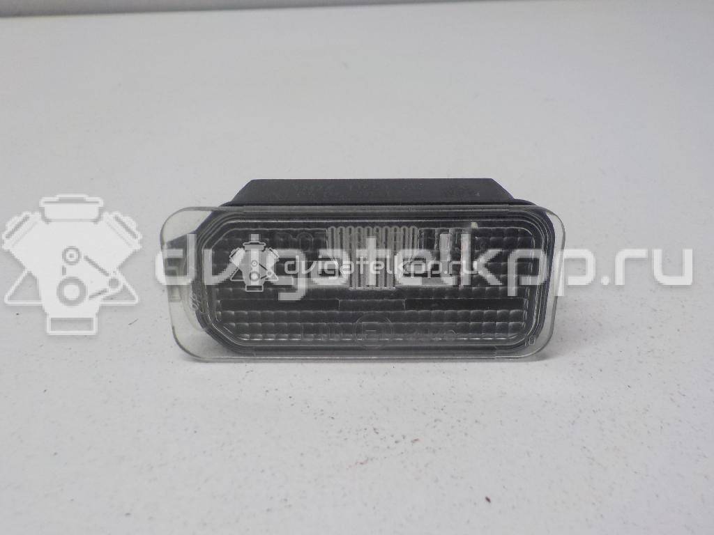 Фото Фонарь подсветки номера  6M2A13550AC для Ford Fiesta / Focus / Tourneo / C-Max / Ka {forloop.counter}}