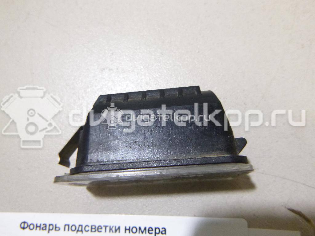 Фото Фонарь подсветки номера  6M2A13550AC для Ford Fiesta / Focus / Tourneo / C-Max / Ka {forloop.counter}}