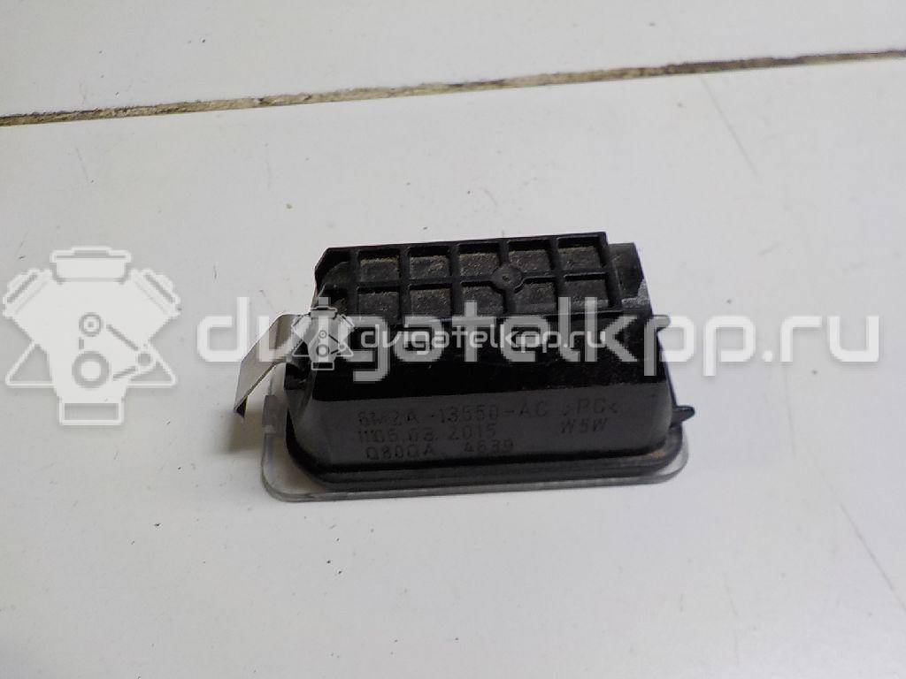 Фото Фонарь подсветки номера  6M2A13550AC для Ford Fiesta / Focus / Tourneo / C-Max / Ka {forloop.counter}}