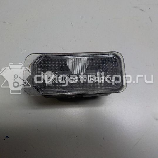 Фото Фонарь подсветки номера  6M2A13550AC для Ford Fiesta / Focus / Tourneo / C-Max / Ka