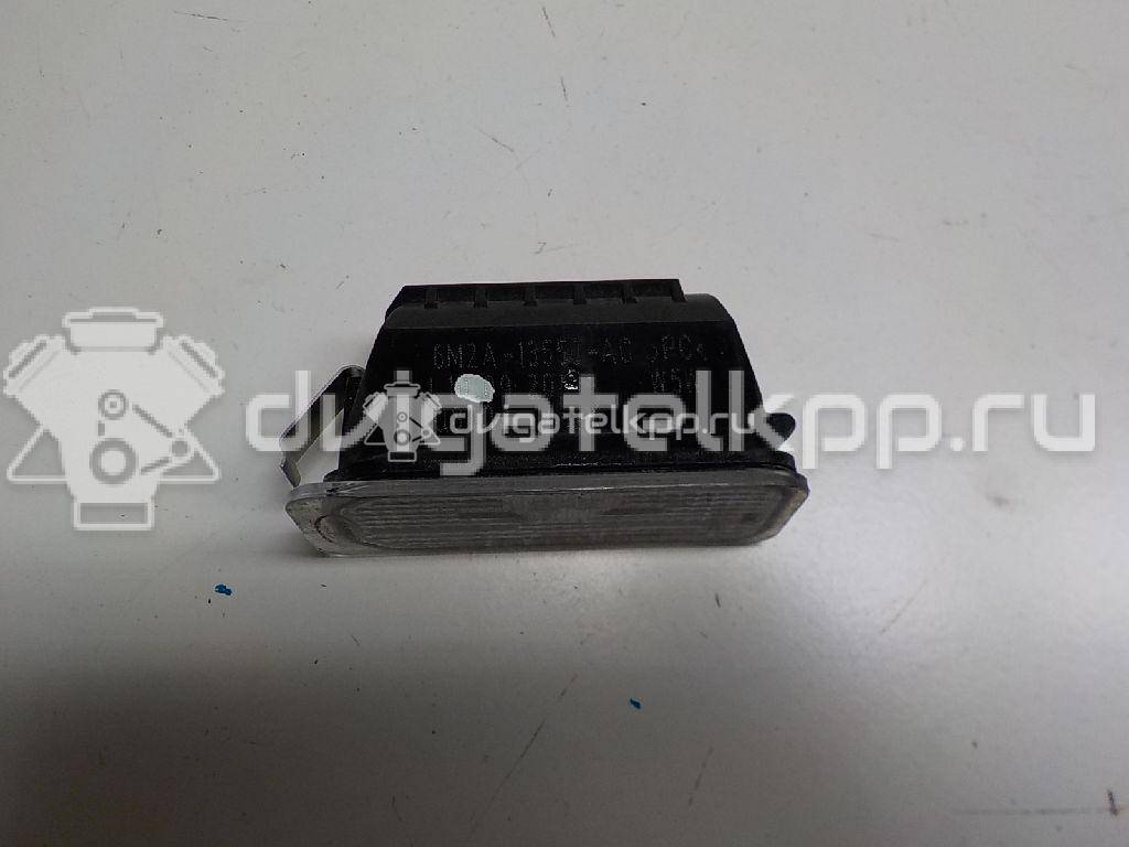 Фото Фонарь подсветки номера  6M2A13550AC для Ford Fiesta / Focus / Tourneo / C-Max / Ka {forloop.counter}}