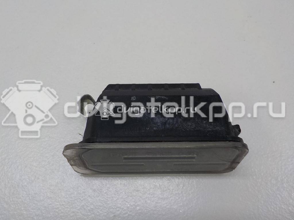 Фото Фонарь подсветки номера  5105886 для Ford Fiesta / Focus / Tourneo / C-Max / Ka {forloop.counter}}