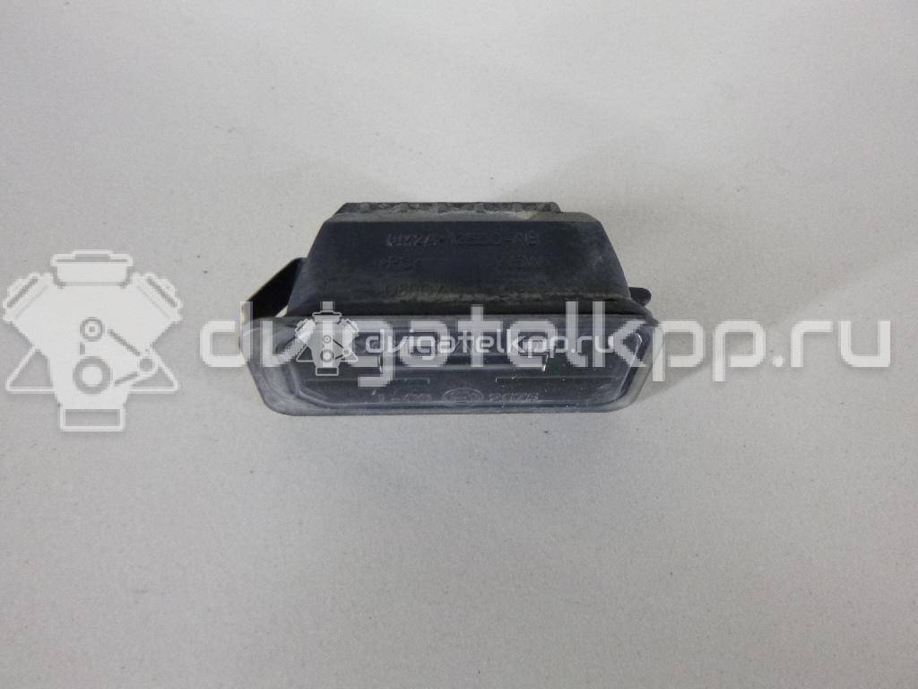 Фото Фонарь подсветки номера  5105886 для Ford Fiesta / Focus / Tourneo / C-Max / Ka {forloop.counter}}