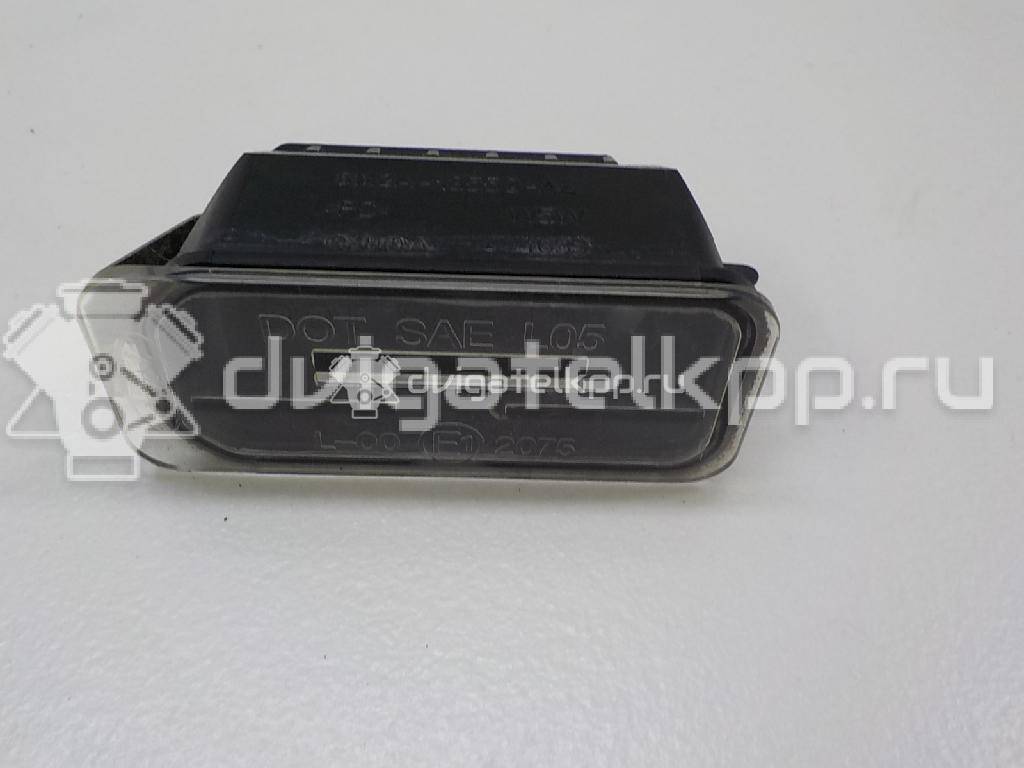 Фото Фонарь подсветки номера  5105886 для Ford Fiesta / Focus / Tourneo / C-Max / Ka {forloop.counter}}