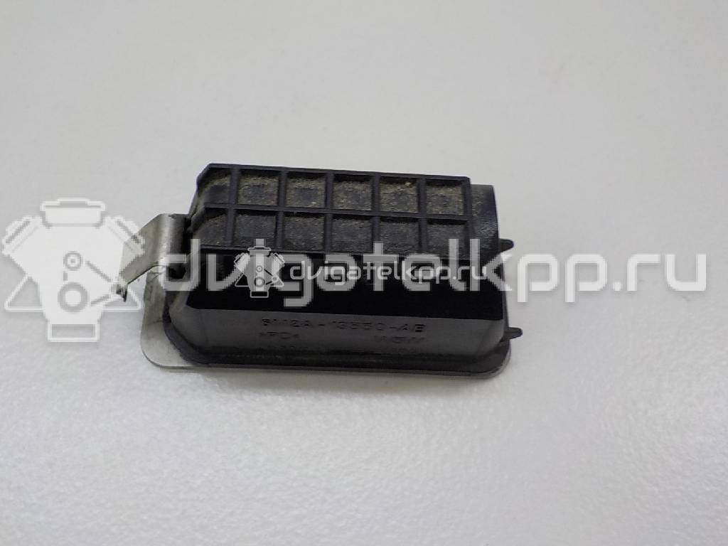 Фото Фонарь подсветки номера  5105886 для Ford Fiesta / Focus / Tourneo / C-Max / Ka {forloop.counter}}