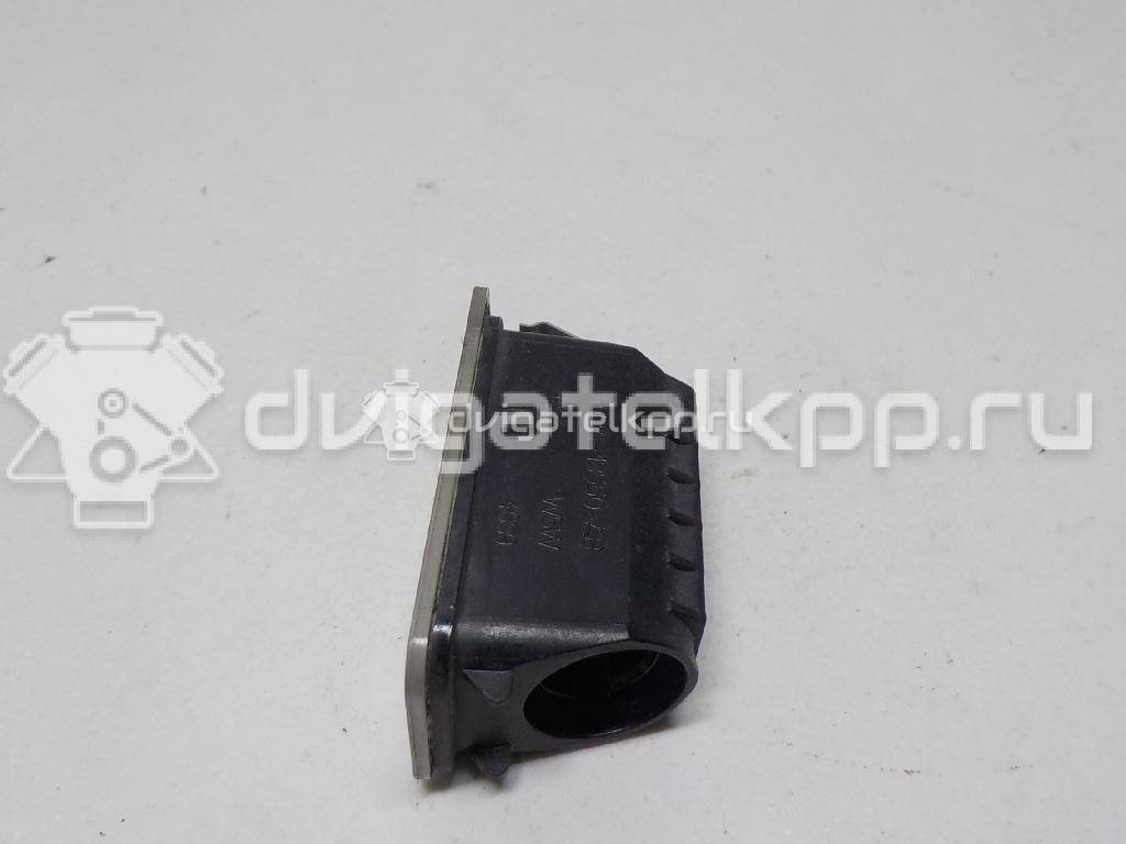 Фото Фонарь подсветки номера  5105886 для Ford Fiesta / Focus / Tourneo / C-Max / Ka {forloop.counter}}