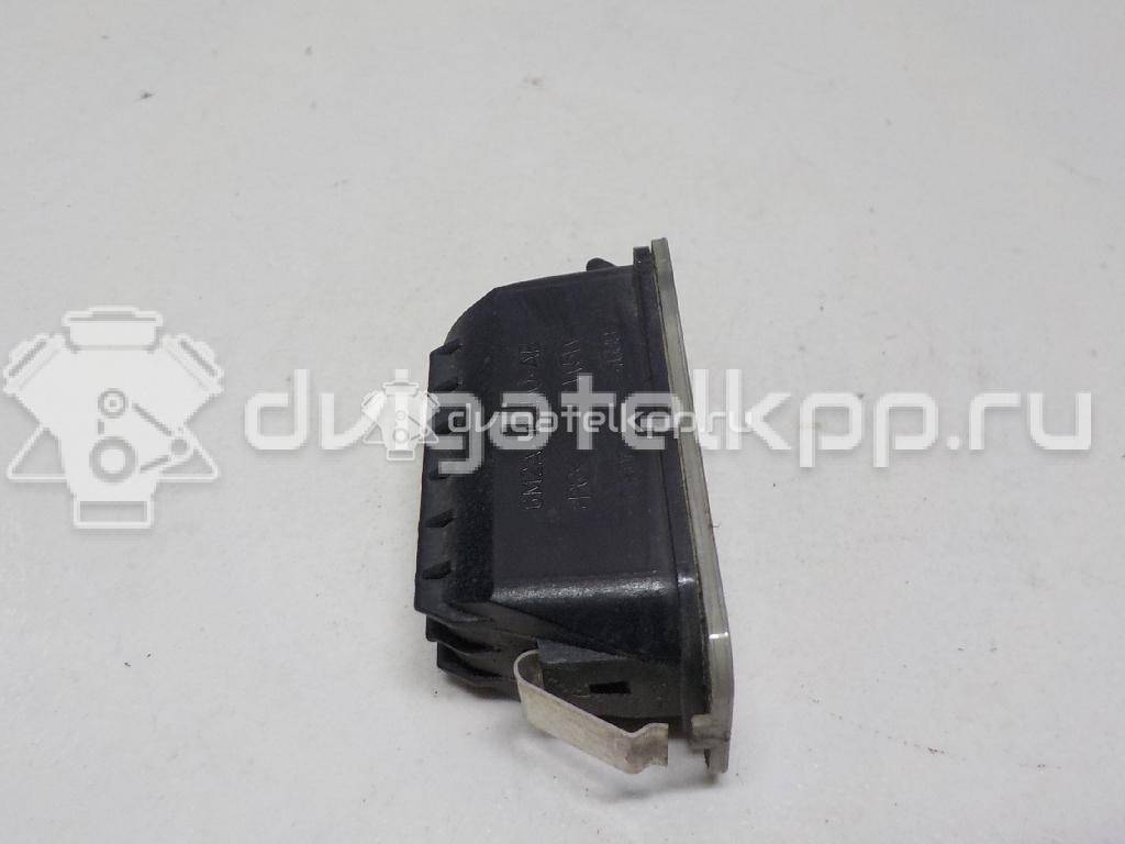 Фото Фонарь подсветки номера  5105886 для Ford Fiesta / Focus / Tourneo / C-Max / Ka {forloop.counter}}