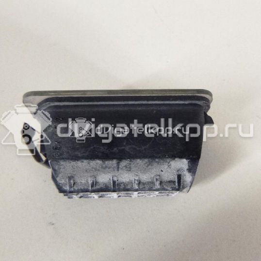 Фото Фонарь подсветки номера  5105886 для Ford Fiesta / Focus / Tourneo / C-Max / Ka