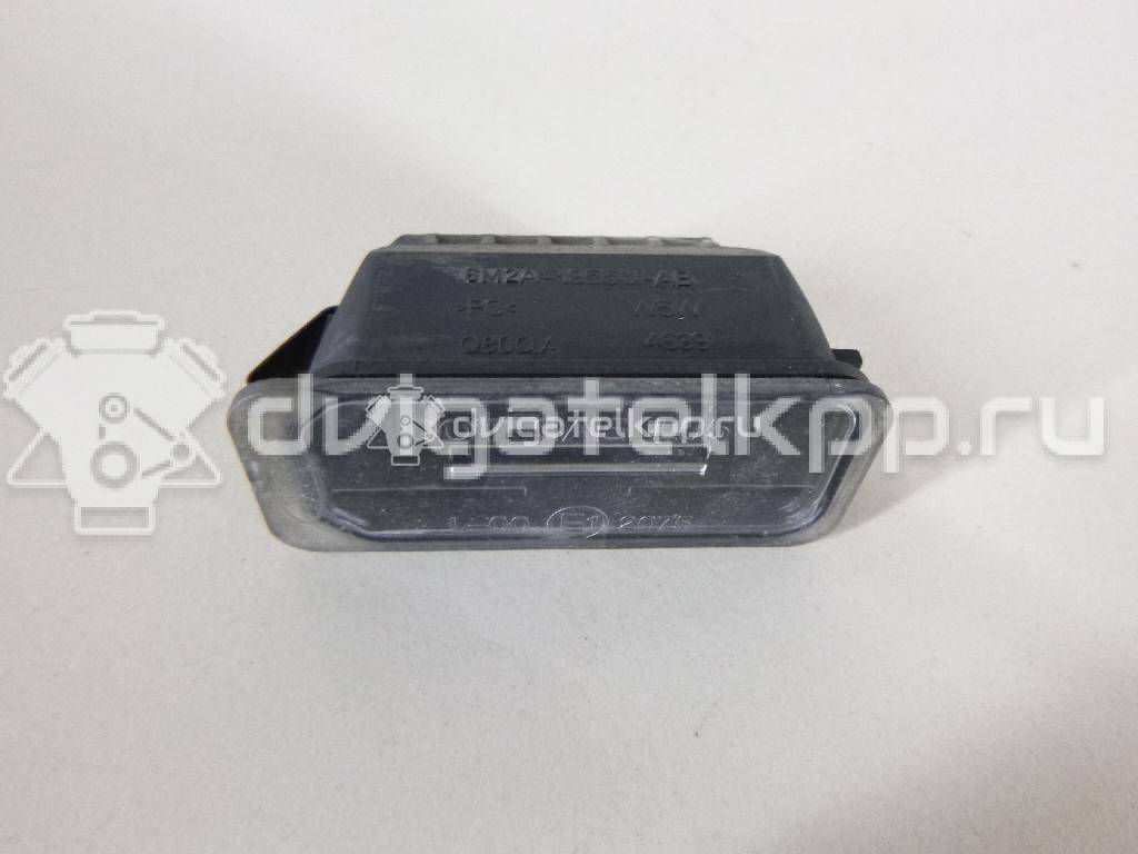 Фото Фонарь подсветки номера  5105886 для Ford Fiesta / Focus / Tourneo / C-Max / Ka {forloop.counter}}