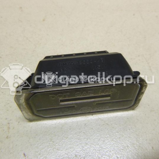 Фото Фонарь подсветки номера  5105886 для Ford Fiesta / Focus / Tourneo / C-Max / Ka