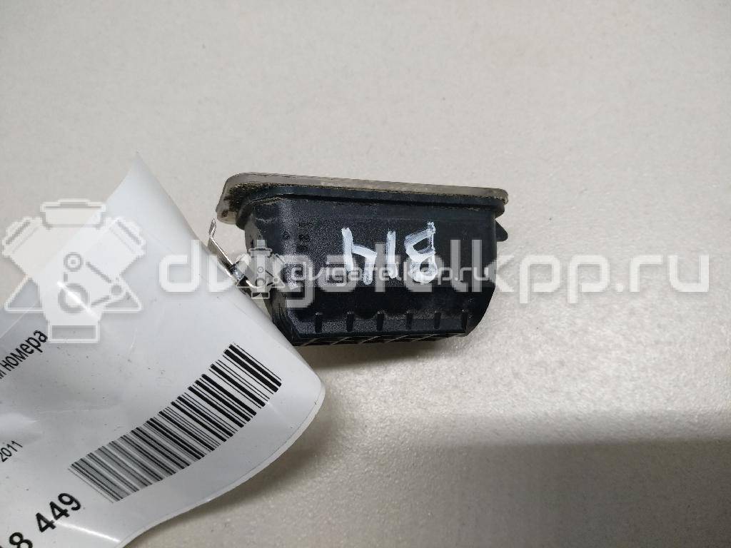 Фото Фонарь подсветки номера  5105886 для Ford Fiesta / Focus / Tourneo / C-Max / Ka {forloop.counter}}