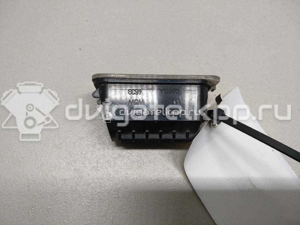 Фото Фонарь подсветки номера  5105886 для Ford Fiesta / Focus / Tourneo / C-Max / Ka {forloop.counter}}