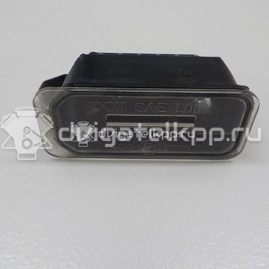 Фото Фонарь подсветки номера  5105886 для Ford Fiesta / Focus / Tourneo / C-Max / Ka