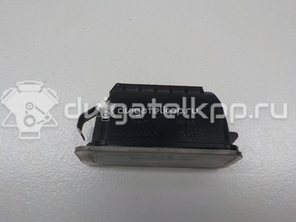 Фото Фонарь подсветки номера  5105886 для Ford Fiesta / Focus / Tourneo / C-Max / Ka {forloop.counter}}