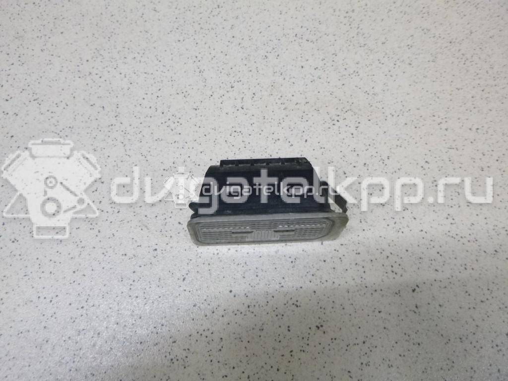 Фото Фонарь подсветки номера  5105886 для Ford Fiesta / Focus / Tourneo / C-Max / Ka {forloop.counter}}