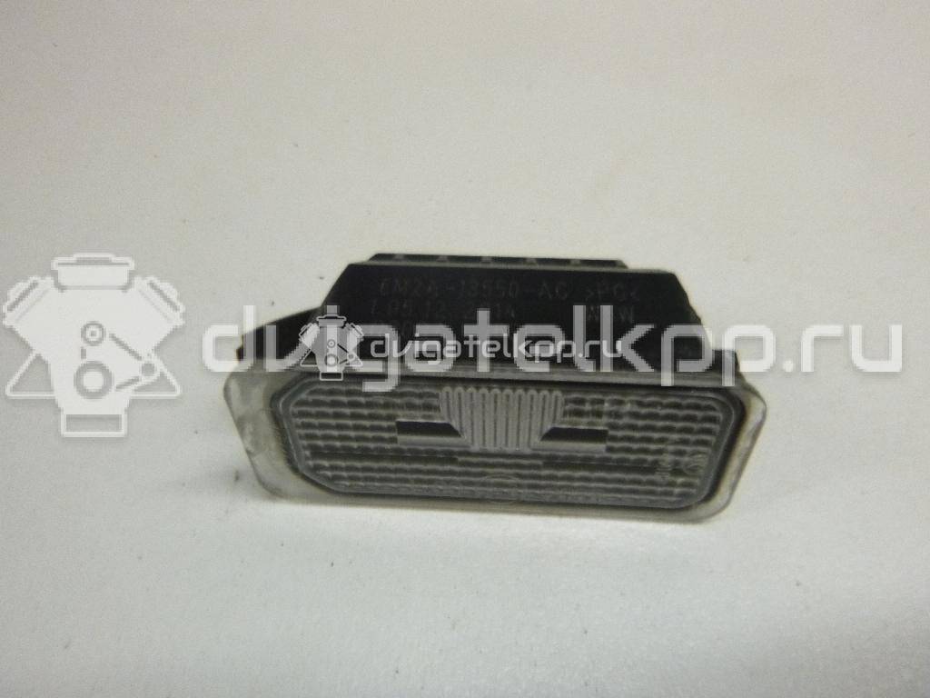 Фото Фонарь подсветки номера  5105886 для Ford Fiesta / Focus / Tourneo / C-Max / Ka {forloop.counter}}