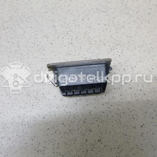 Фото Фонарь подсветки номера  5105886 для Ford Fiesta / Focus / Tourneo / C-Max / Ka