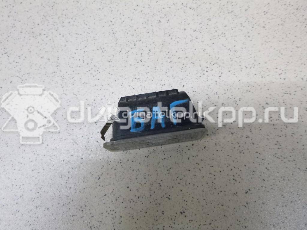 Фото Фонарь подсветки номера  5105886 для Ford Fiesta / Focus / Tourneo / C-Max / Ka {forloop.counter}}