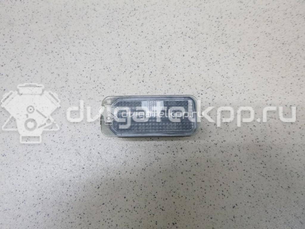 Фото Фонарь подсветки номера  5105886 для Ford Fiesta / Focus / Tourneo / C-Max / Ka {forloop.counter}}