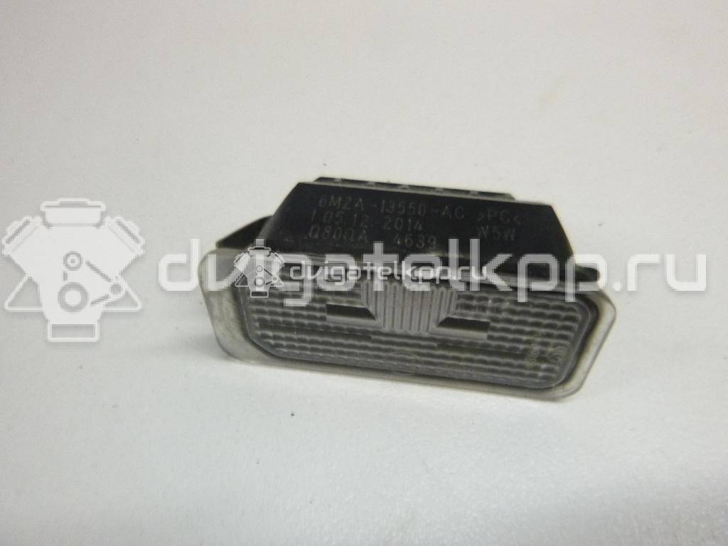 Фото Фонарь подсветки номера  5105886 для Ford Fiesta / Focus / Tourneo / C-Max / Ka {forloop.counter}}