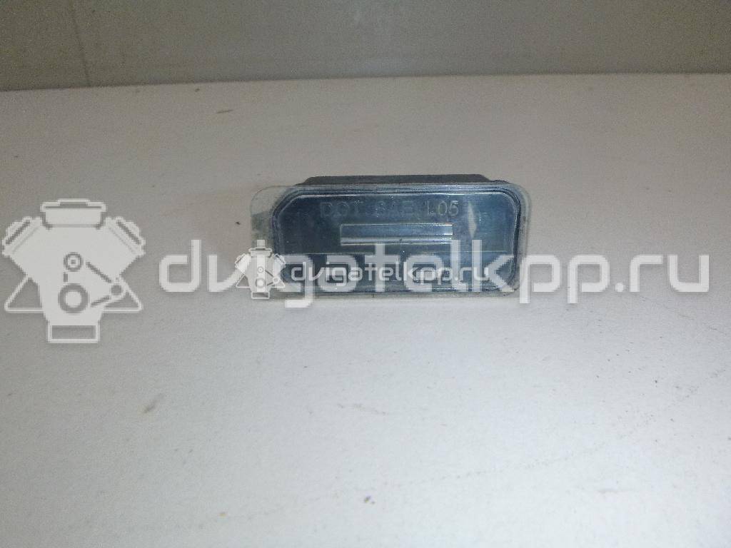 Фото Фонарь подсветки номера  5105886 для Ford Fiesta / Focus / Tourneo / C-Max / Ka {forloop.counter}}