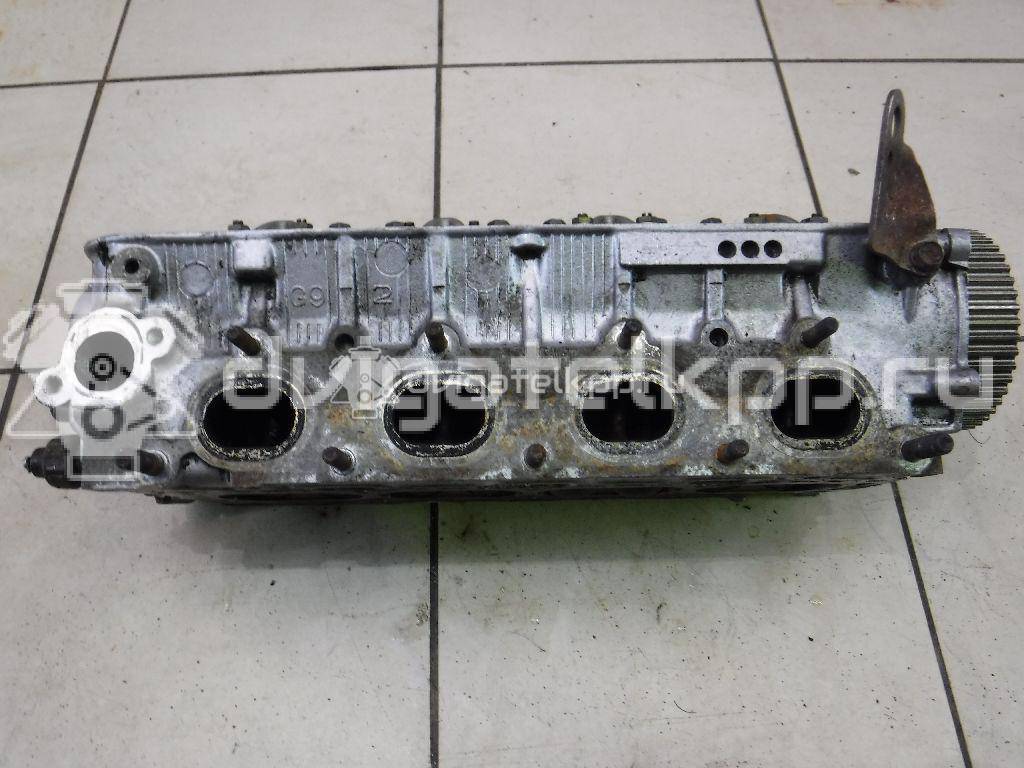 Фото Головка блока для двигателя 4G92 (DOHC 16V) для Mitsubishi Mirage 147-174 л.с 16V 1.6 л бензин {forloop.counter}}