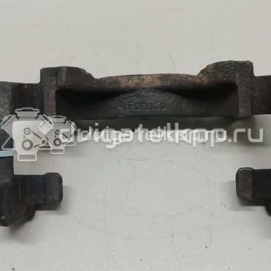 Фото Скоба суппорта переднего  1432360 для Ford Fiesta / Focus / Tourneo / Scorpio / Sierra