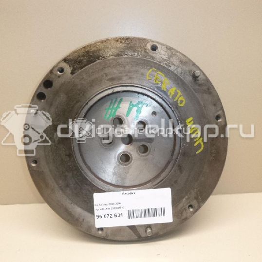 Фото Маховик для двигателя G4EE для Hyundai / Kia 97 л.с 16V 1.4 л бензин 2320026101