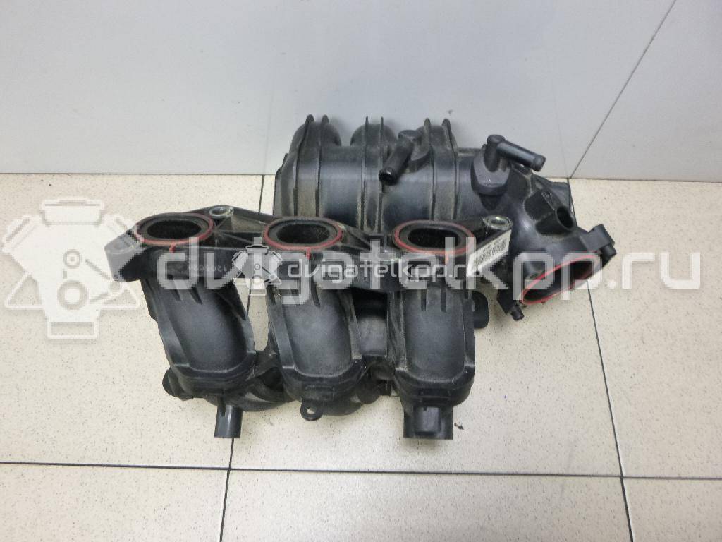 Фото Коллектор впускной для двигателя G3LA для Hyundai / Kia 67-82 л.с 12V 1.0 л бензин 2831004030 {forloop.counter}}