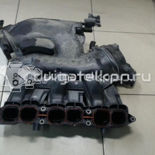 Фото Коллектор впускной для двигателя VQ25DE для Mitsuoka / Samsung / Nissan 182-209 л.с 24V 2.5 л бензин 14010JN00A