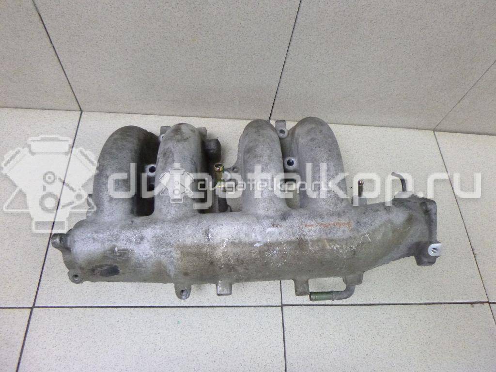 Фото Коллектор впускной для двигателя QR25DE для Nissan (Dongfeng) / Suzuki / Mitsuoka / Nissan 141-203 л.с 16V 2.5 л Бензин / этиловый спирт / природный газ 14010AE001 {forloop.counter}}