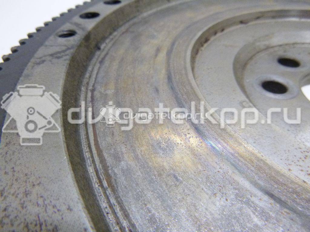 Фото Маховик для двигателя ADY для Volkswagen Passat / Corrado 53I 115 л.с 8V 2.0 л бензин 028105269B {forloop.counter}}