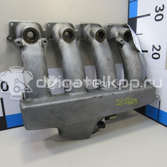 Фото Коллектор впускной для двигателя AWT для Volkswagen Passat 150 л.с 20V 1.8 л бензин 06B133201AM