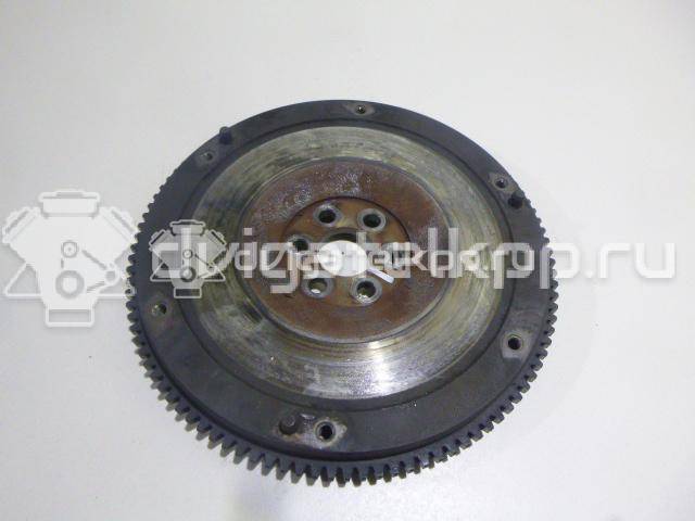 Фото Маховик для двигателя 1SZ-FE для Toyota Yaris / Platz Ncp1 , Scp1 65-68 л.с 16V 1.0 л бензин 1340523040 {forloop.counter}}