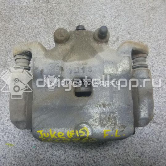 Фото Суппорт тормозной передний левый  410111KC2C для Nissan Tiida / 200 Sx / Primera / Cefiro / Prairie