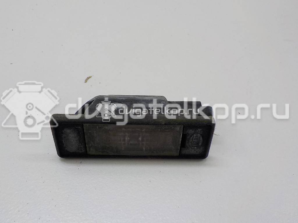 Фото Фонарь подсветки номера  26510AU300 для Nissan Primera / Micra / Note / Nv200 / Np300 {forloop.counter}}