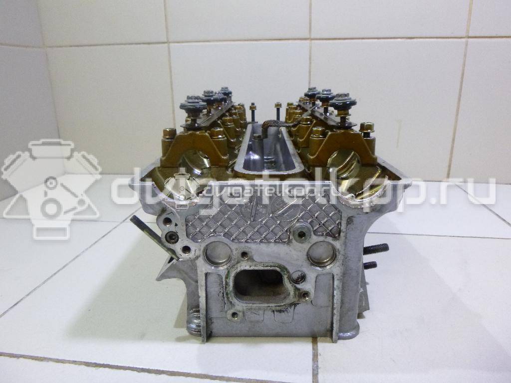 Фото Головка блока для двигателя M62 B44 (448S2) для Bmw 5 / X5 / 7 286 л.с 32V 4.4 л бензин 11121745458 {forloop.counter}}