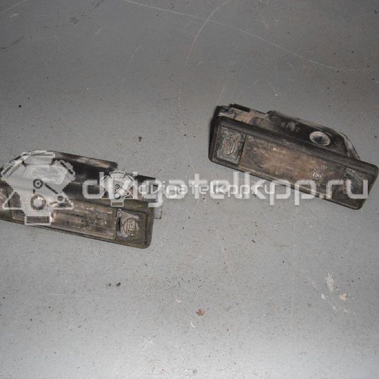 Фото Фонарь подсветки номера  634087 для Peugeot 406 / 106 / 605 6B / 806 221 / 306