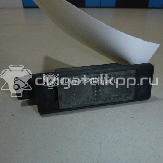 Фото Фонарь подсветки номера  6340F0 для Peugeot 308 / 207 / 307 / 3008