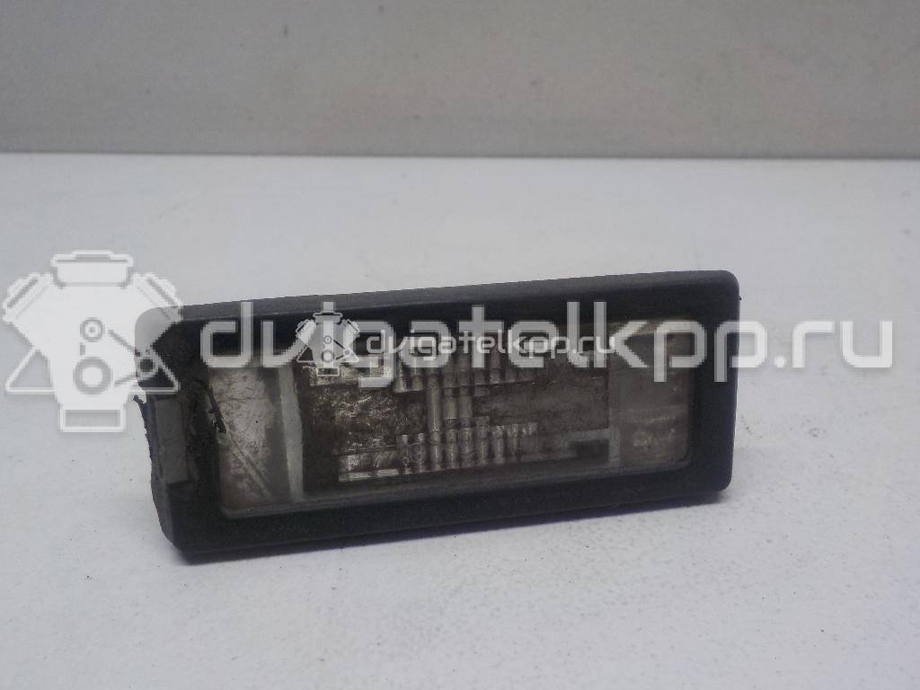 Фото Фонарь подсветки номера  8200013577 для Renault Modus Grand F Jp0 / Megane / Clio / Laguna / Scénic {forloop.counter}}