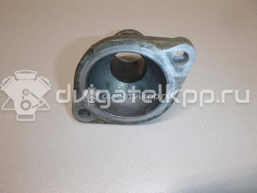 Фото Крышка термостата для двигателя 4G63 (SOHC 8V) для Mitsubishi Galant / L / Space / Sapporo / Tredia A21 86-137 л.с 8V 2.0 л бензин MD152090 {forloop.counter}}